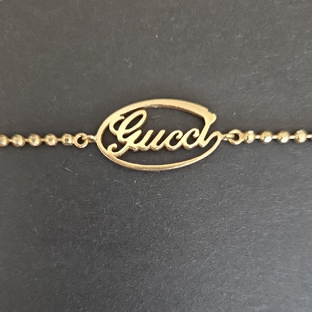 Gucci Women's 18k Solid Gold Logo Bracelet